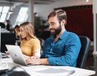 Man and woman studying Python and Machine Learning